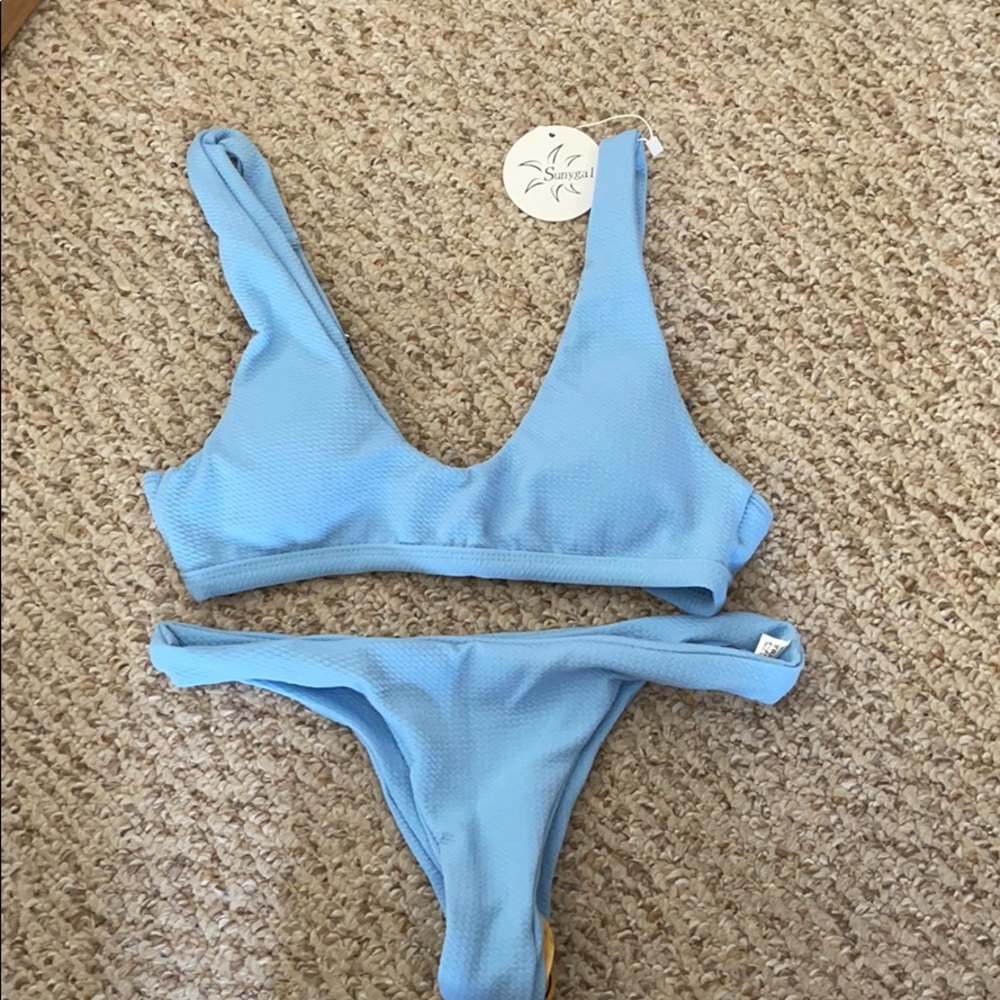 Blue swimsuit (all offers will be considered)